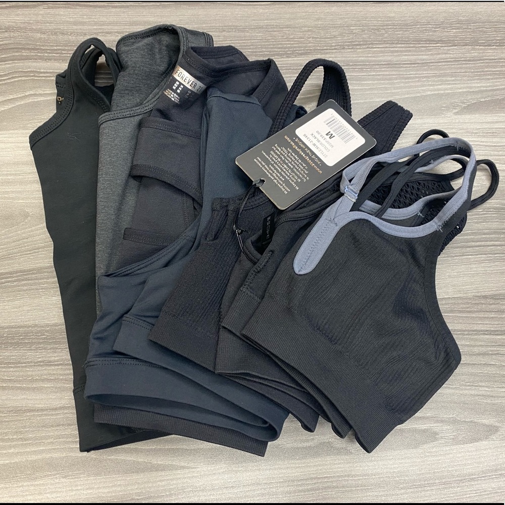 Lot of 7 black sports bras Size Medium